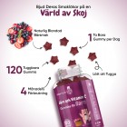 En burk som ligger och där Järn och Vitamin C gummies har ramlat ut, runt omkring är det text om hur många man bör äta och hur länge en burk räcker.