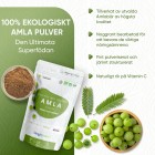 En förpackning med WeightWorlds Ekologiskt Amla Pulver 200 g och en skål med amlabär, tillsammans med produktinformation
