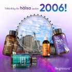 Flera burkar med olika WeightWorld-produkter, och stadsmiljö i bakgrunden.